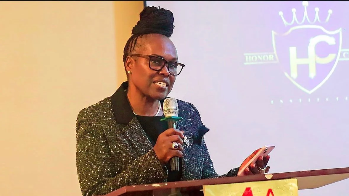 Ann Njogu with a microphone